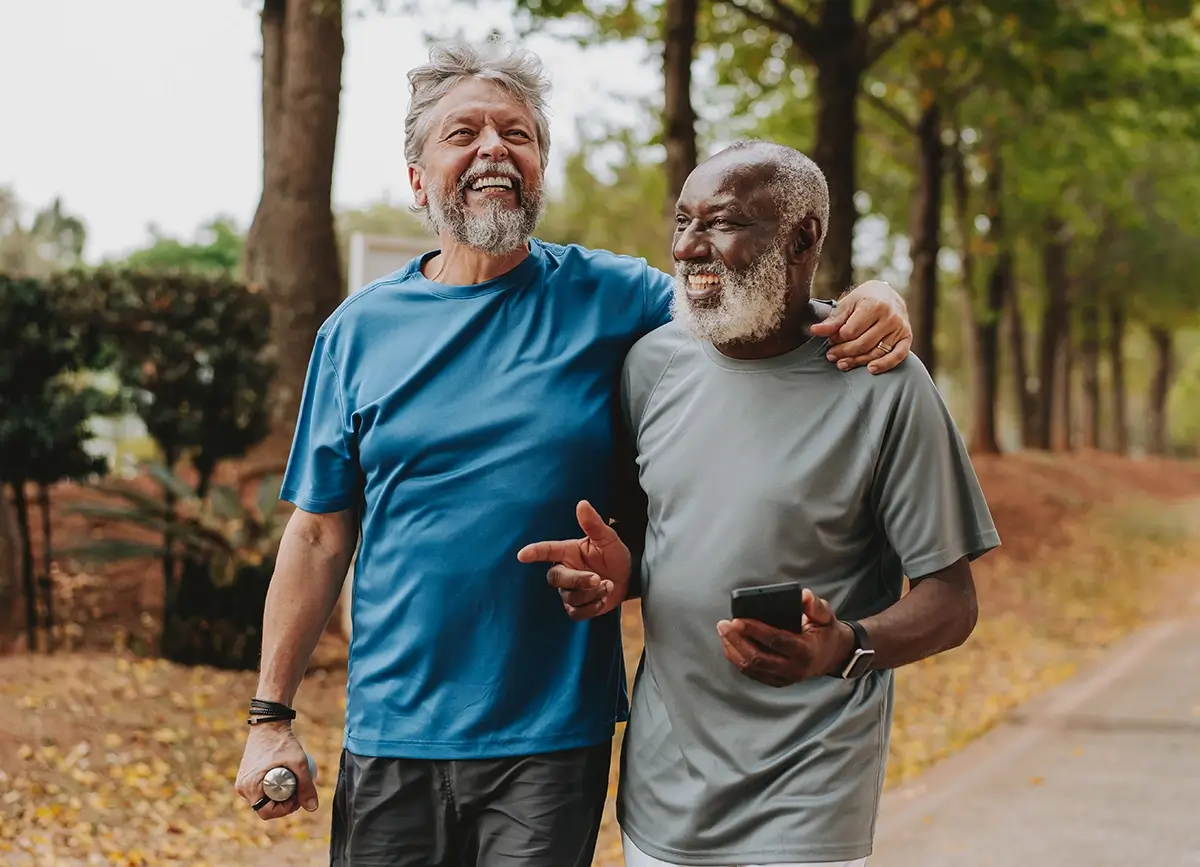 Two friends going for a walk and laughing