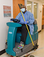 Enviromental Services cleaning floors at hospital